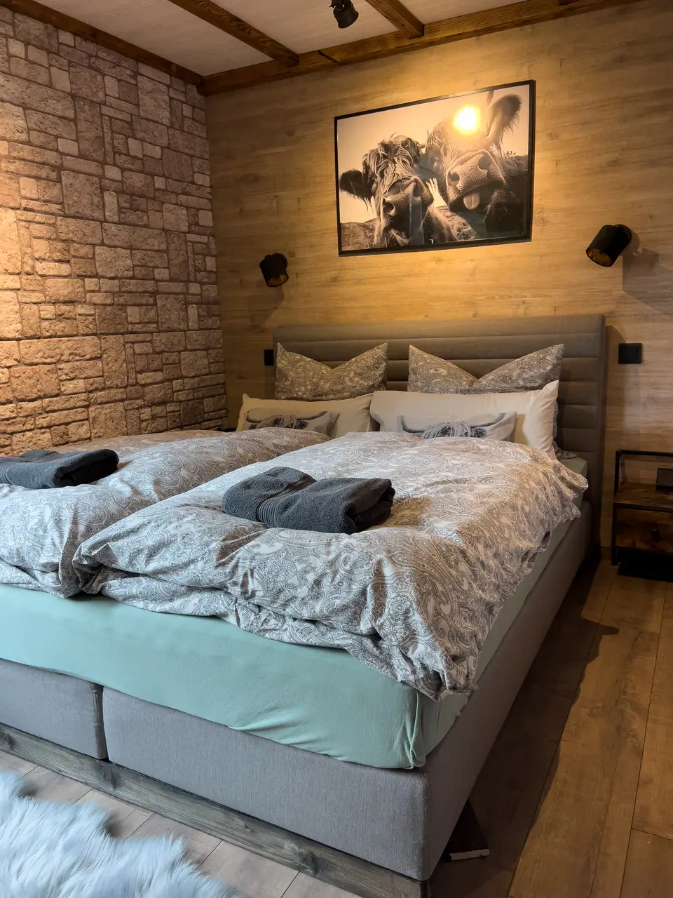 Double bed with wall lights