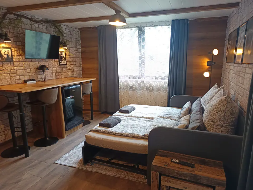 Sofa pulled out as a bed – room for four