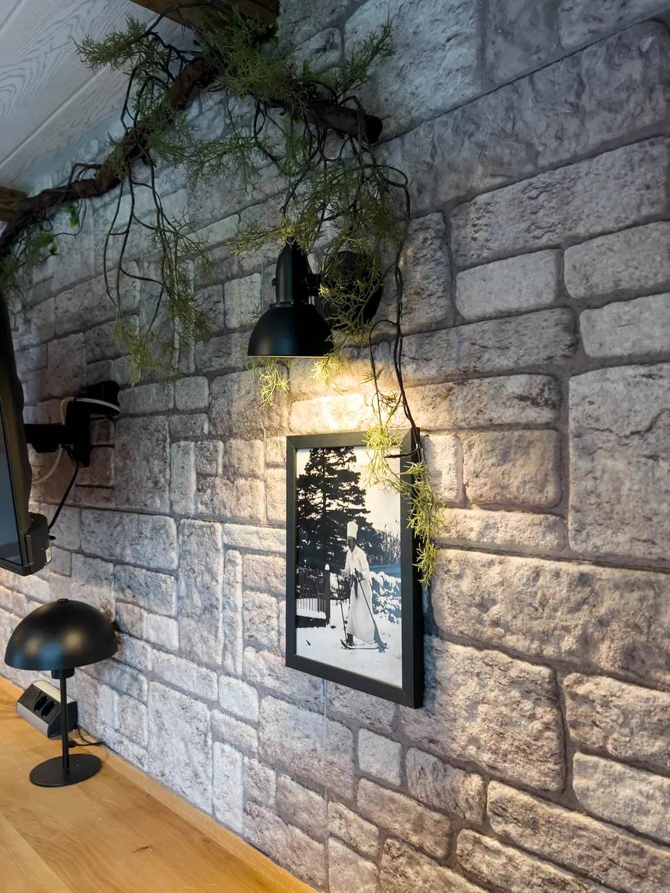 Detail: wall light and black-and-white print